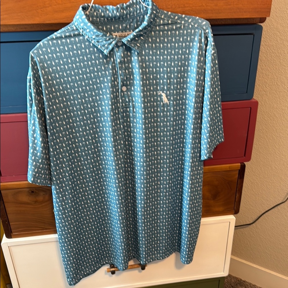 Blue and White Polo Shirt with Geometric Pattern